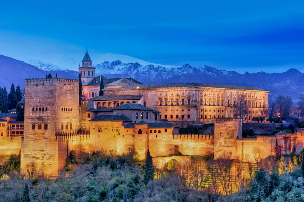 beautiful building near snowy mountains